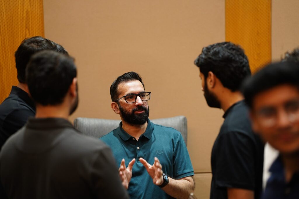 Founders talking in a small circle