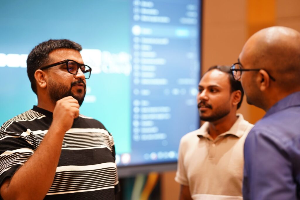 An attendee speaking into a microphone