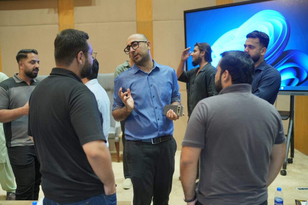 Attendees in a standing conversation