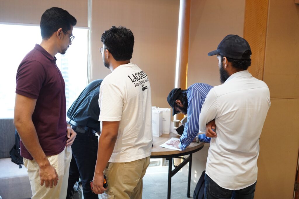 Attendees catching up after the session