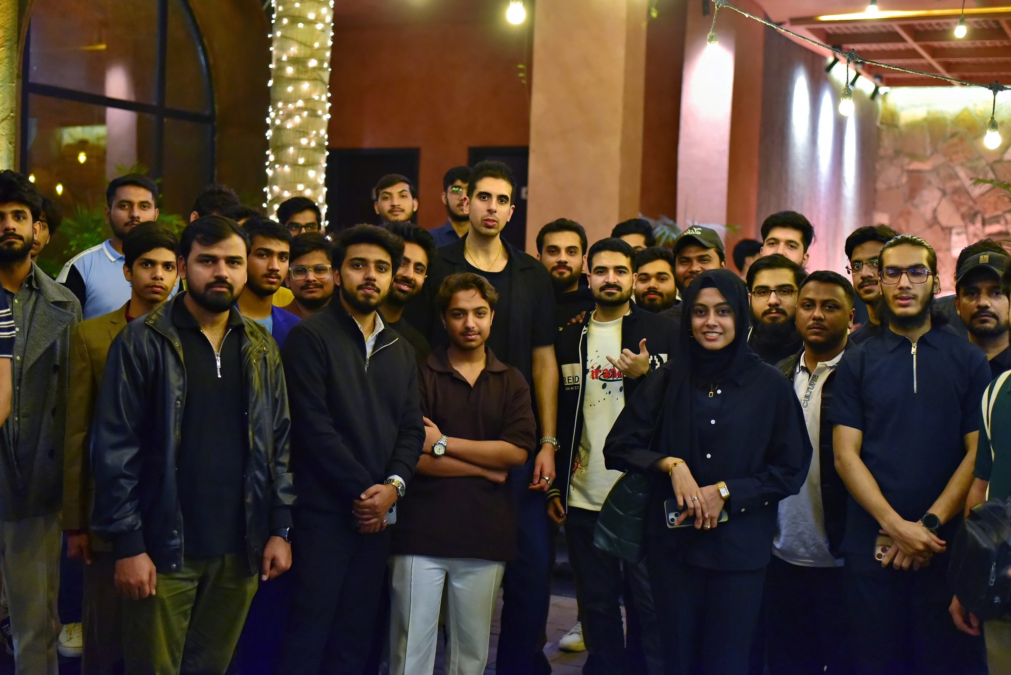 The whole room together for a group photo at the close